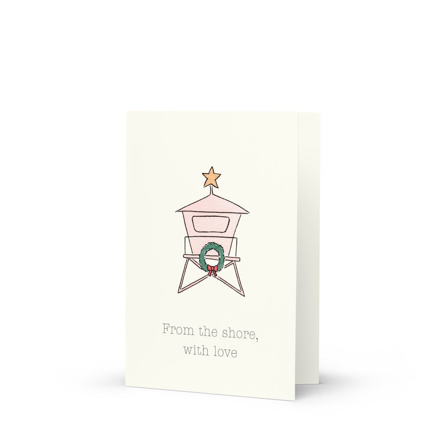 Card with a pink lifeguard tower and wreath illustration on a white background and letterhead that says: "From the shore, with love"