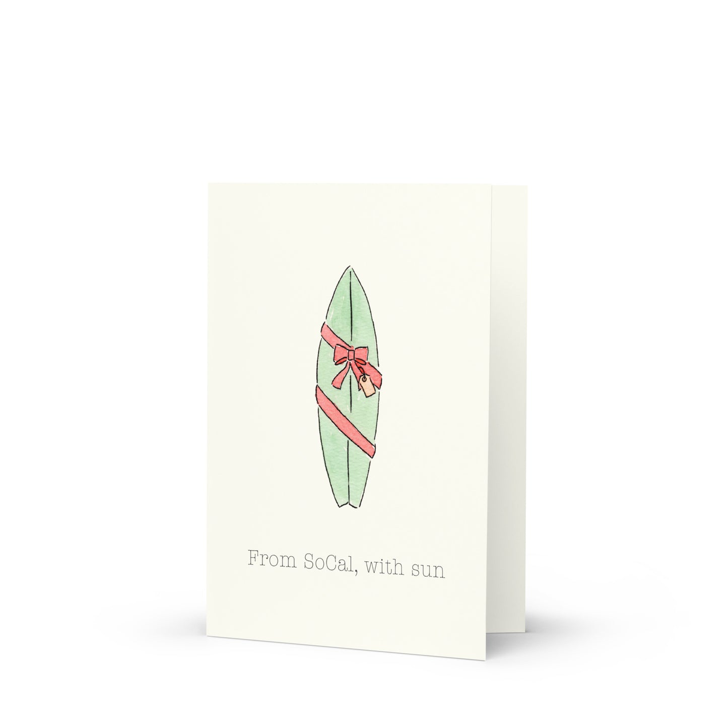 Card with a surfboard as a present illustration and text 'From SoCal, with sun' on a white background