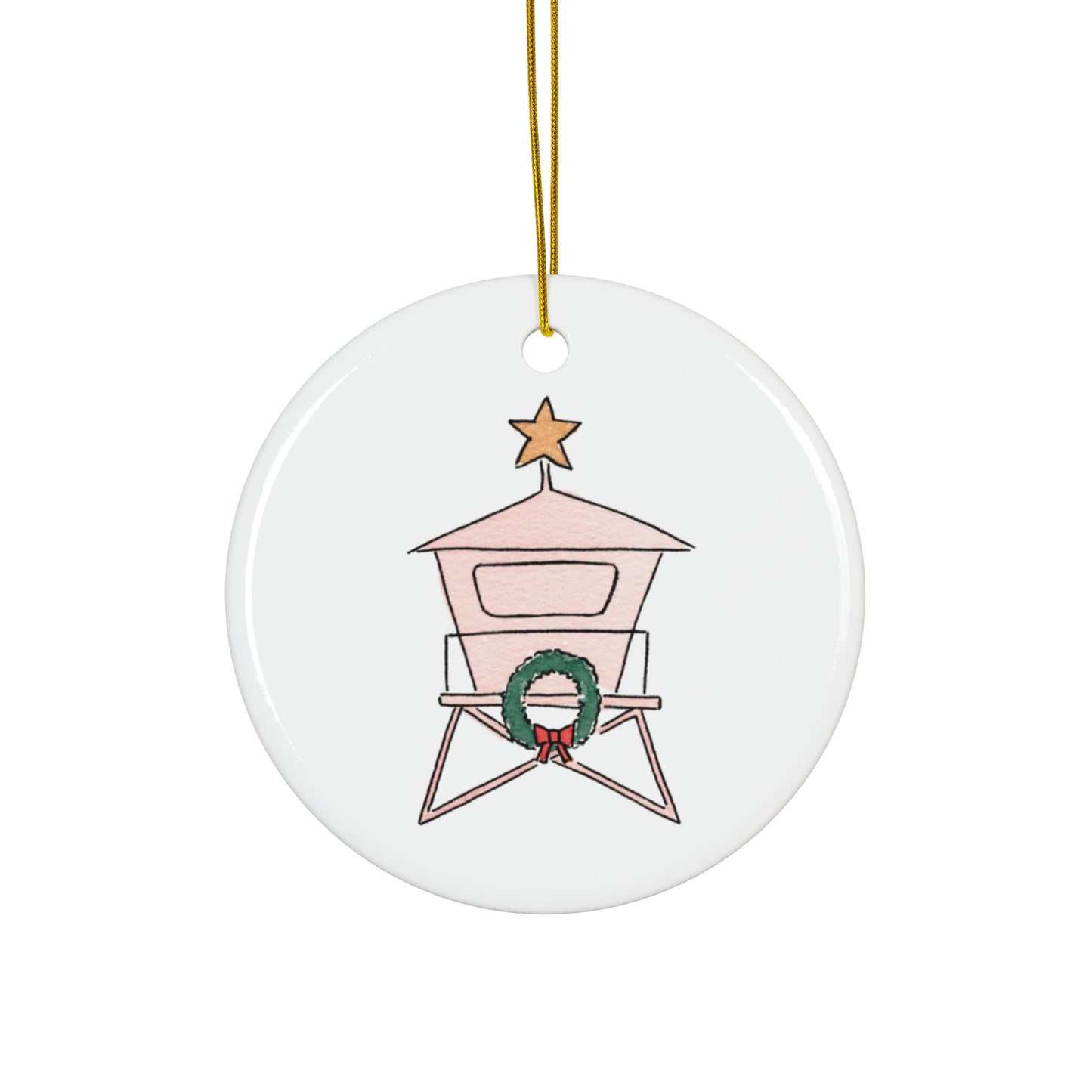 Round ceramic ornament with a lifeguard tower design, featuring a wreath and star on a white background.