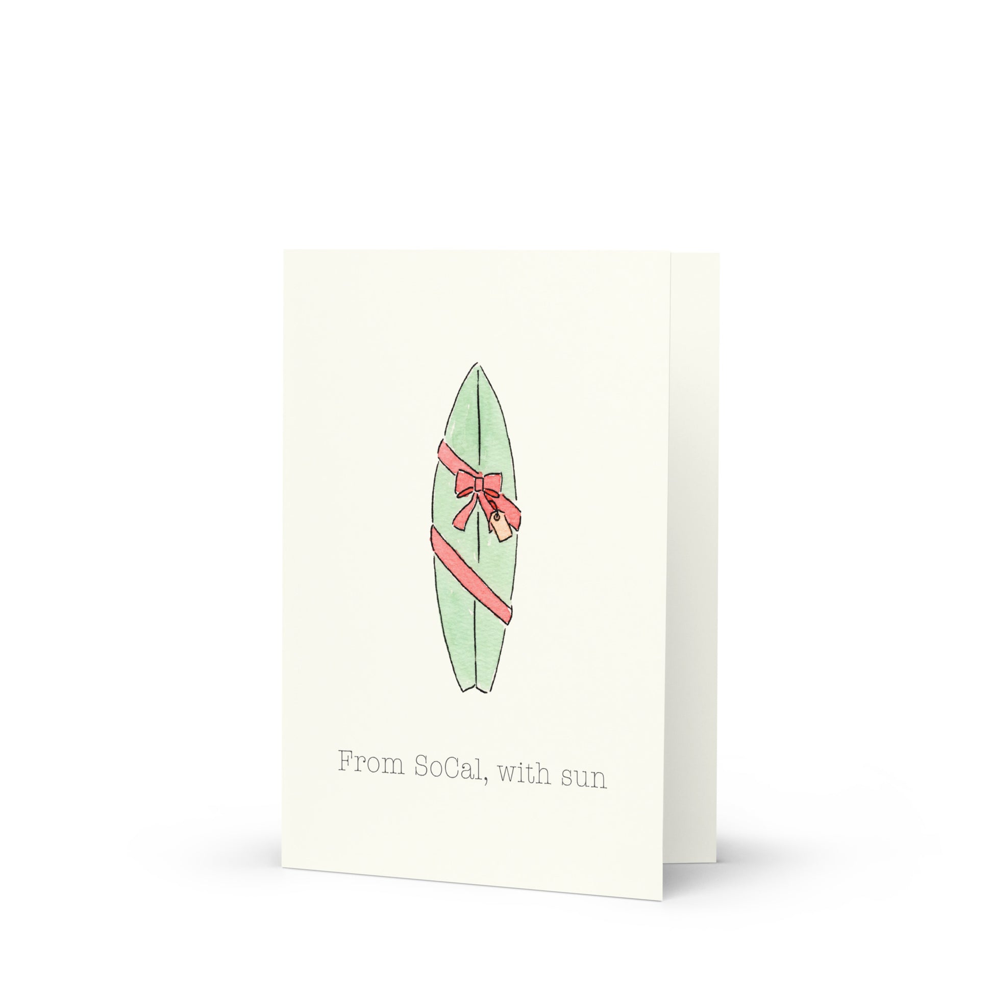 Card with a surfboard as a present illustration and text 'From SoCal, with sun' on a white background