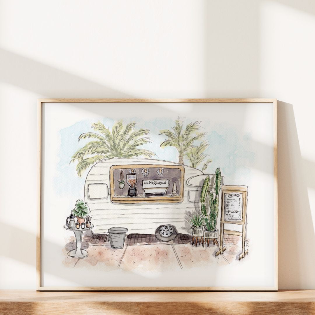 Swil Arts’ “Vintage Vibes and Coffee Tides” is a framed coastal watercolor art print featuring a classic coffee truck, plants, palm trees, and a menu sign—perfect for bright spaces with sunlit shadows.