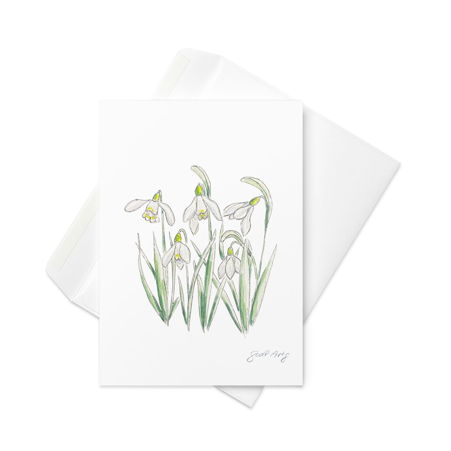 Snowdrop flower greeting card with watercolor and ink botanical illustration. Elegant woodland-inspired note card with blank interior, perfect for nature lovers and special occasions. Sophisticated with white envelope below it.