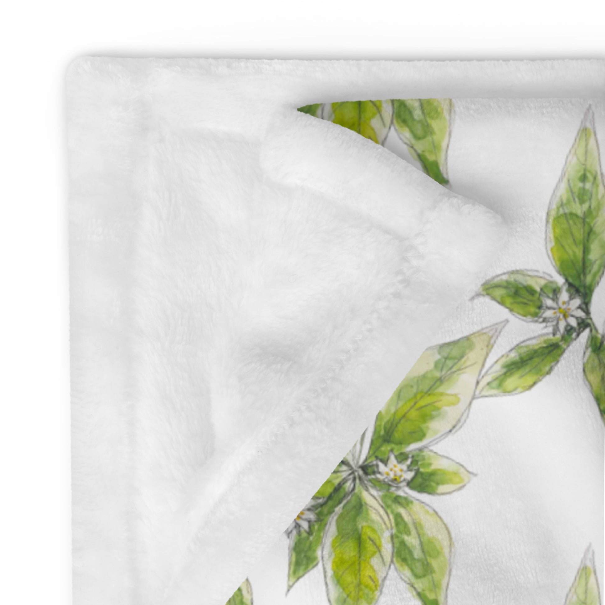 Plush fleece throw blanket with a white starflower watercolor pattern and soft sherpa lining. Cozy botanical home décor with a nature-inspired floral design.