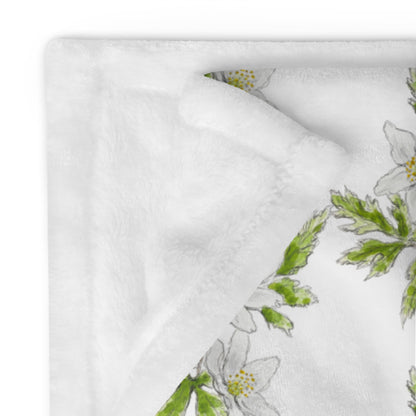 Plush fleece throw blanket with a white wood anemone flower watercolor pattern and soft sherpa lining. Cozy botanical home décor with a nature-inspired floral design.